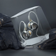 Beyerdynamic's Xelento Wireless earbuds trapped inside a clear crystal.